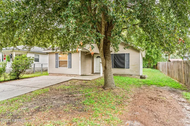 a house with trees in front of it