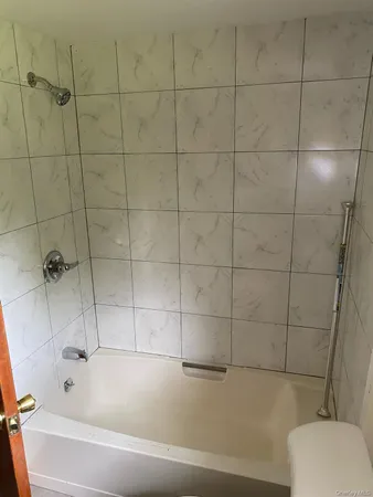 a bathroom with a bathtub