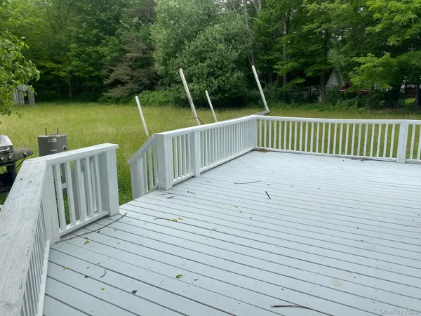 a view of deck and deck with trees