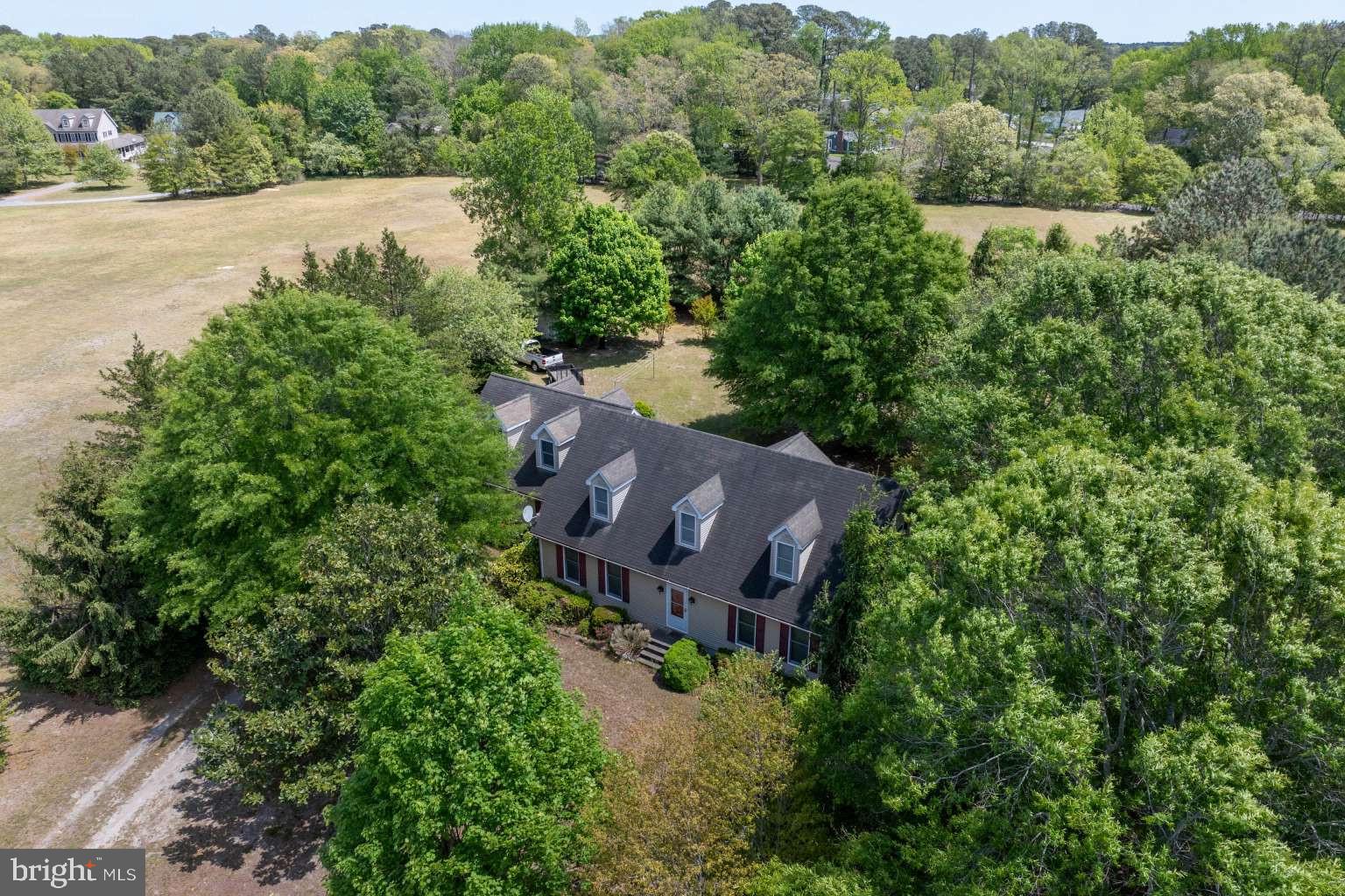37186 Clubhouse Road Ocean View, DE 19970 - Photo 6 of 14 an aerial view of a house with a yard