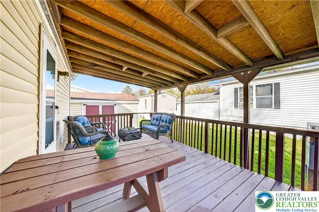 a view of a two chairs in the roof deck