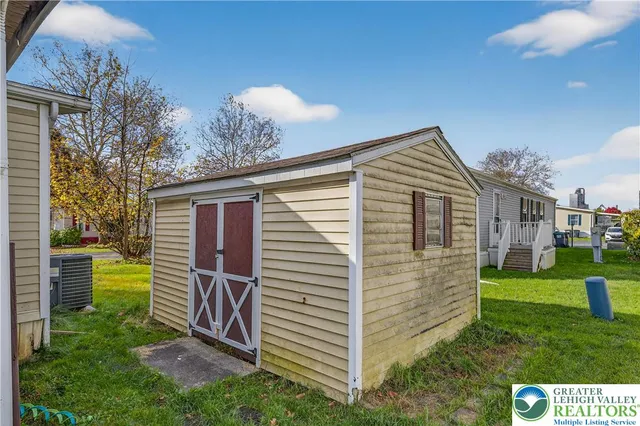 a view of backyard with a garden and plants