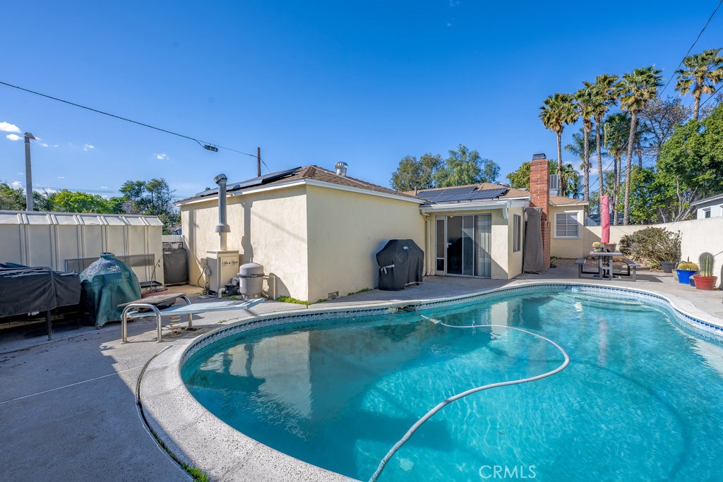 17654 Welby Way Van Nuys, CA 91406 - Photo 24 of 26 a view of a house with pool