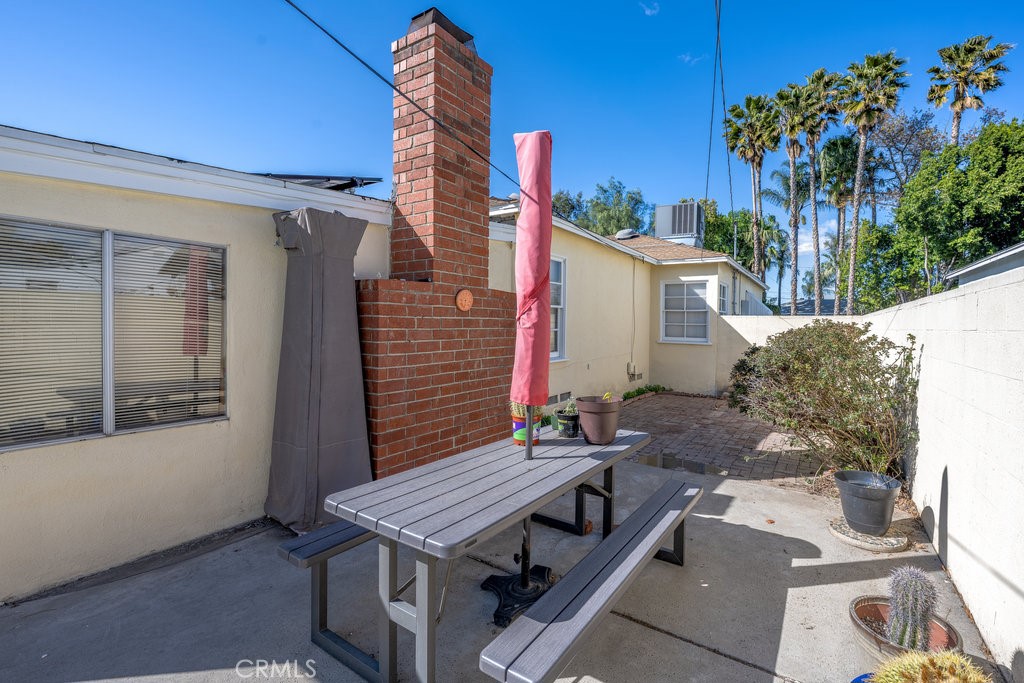 17654 Welby Way Van Nuys, CA 91406 - Photo 25 of 26 a view of a house with a patio