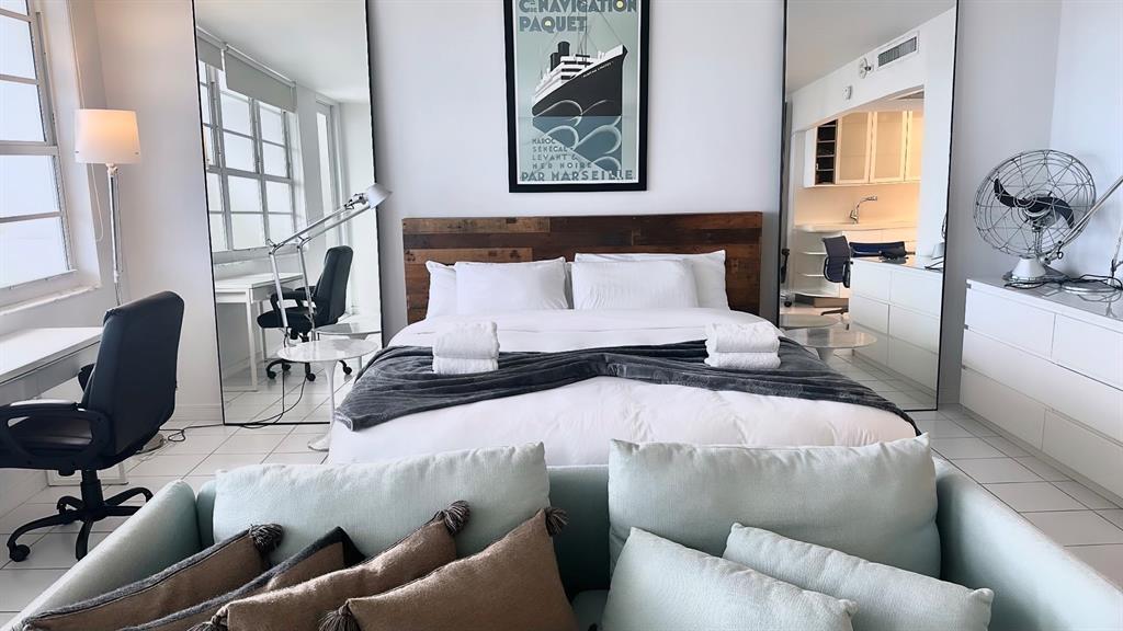 100 Lincoln Road, Unit 1240 Miami Beach, FL 33139 - Photo 2 of 7 a living room with furniture