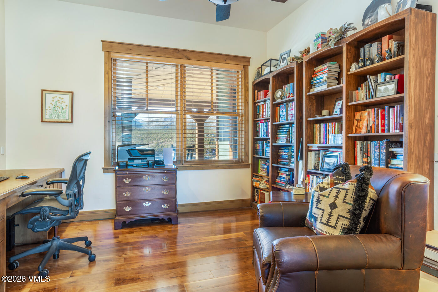 34900 Colorado River Road McCoy, CO 80463 - Photo 26 of 46 a living room with furniture and a bookshelf