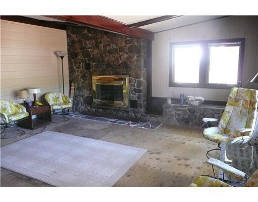 328 Northwest River Road Sebago, ME 04029 - Photo 6 of 12 Living Room. Living Room with Stone...