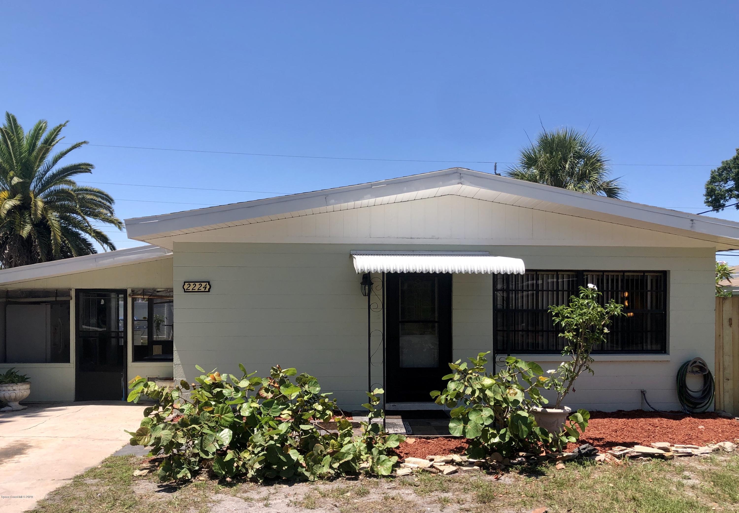 2224 Laden Road Melbourne, FL 32935 - Photo 1 of 26 a view of a house with a yard