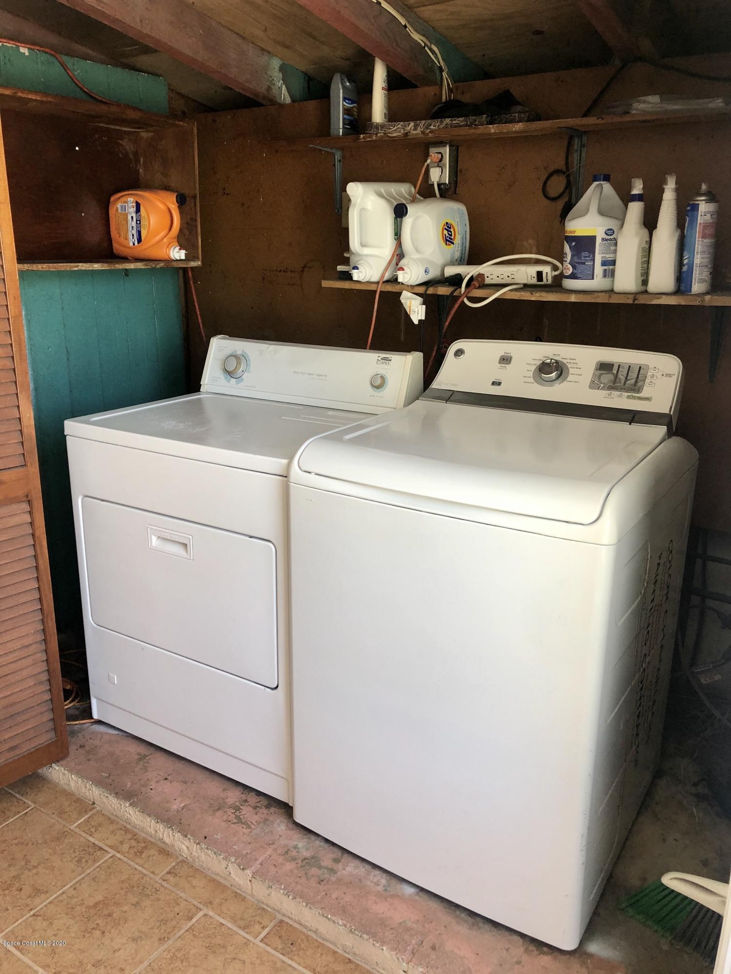 2224 Laden Road Melbourne, FL 32935 - Photo 26 of 26 a utility room with dryer and washer