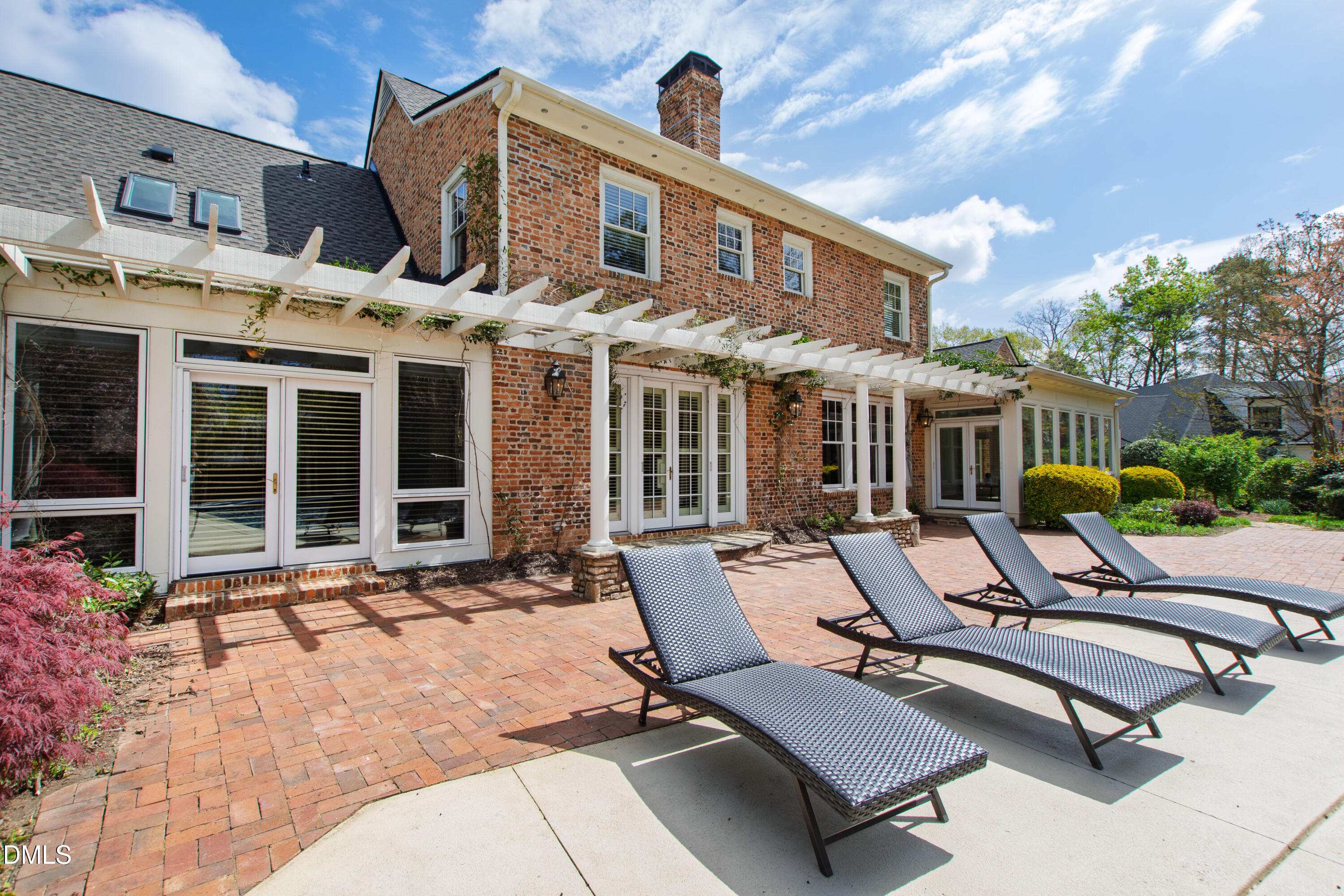 2111 Cook Ridge Court Raleigh, NC 27615 - Photo 7 of 83 a view of a patio with a table and chairs