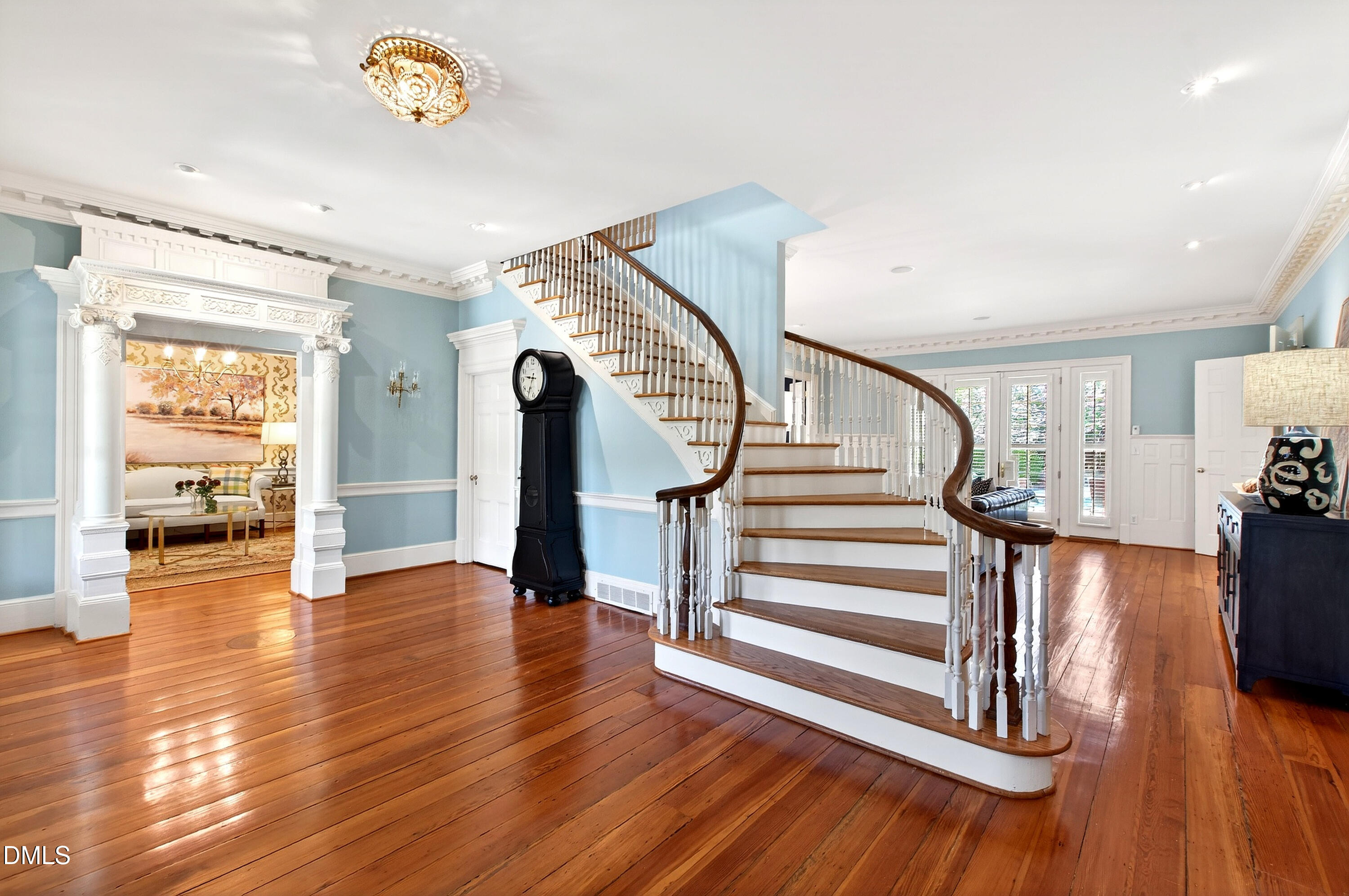 2111 Cook Ridge Court Raleigh, NC 27615 - Photo 15 of 83 a view of entryway and hall with wooden floor