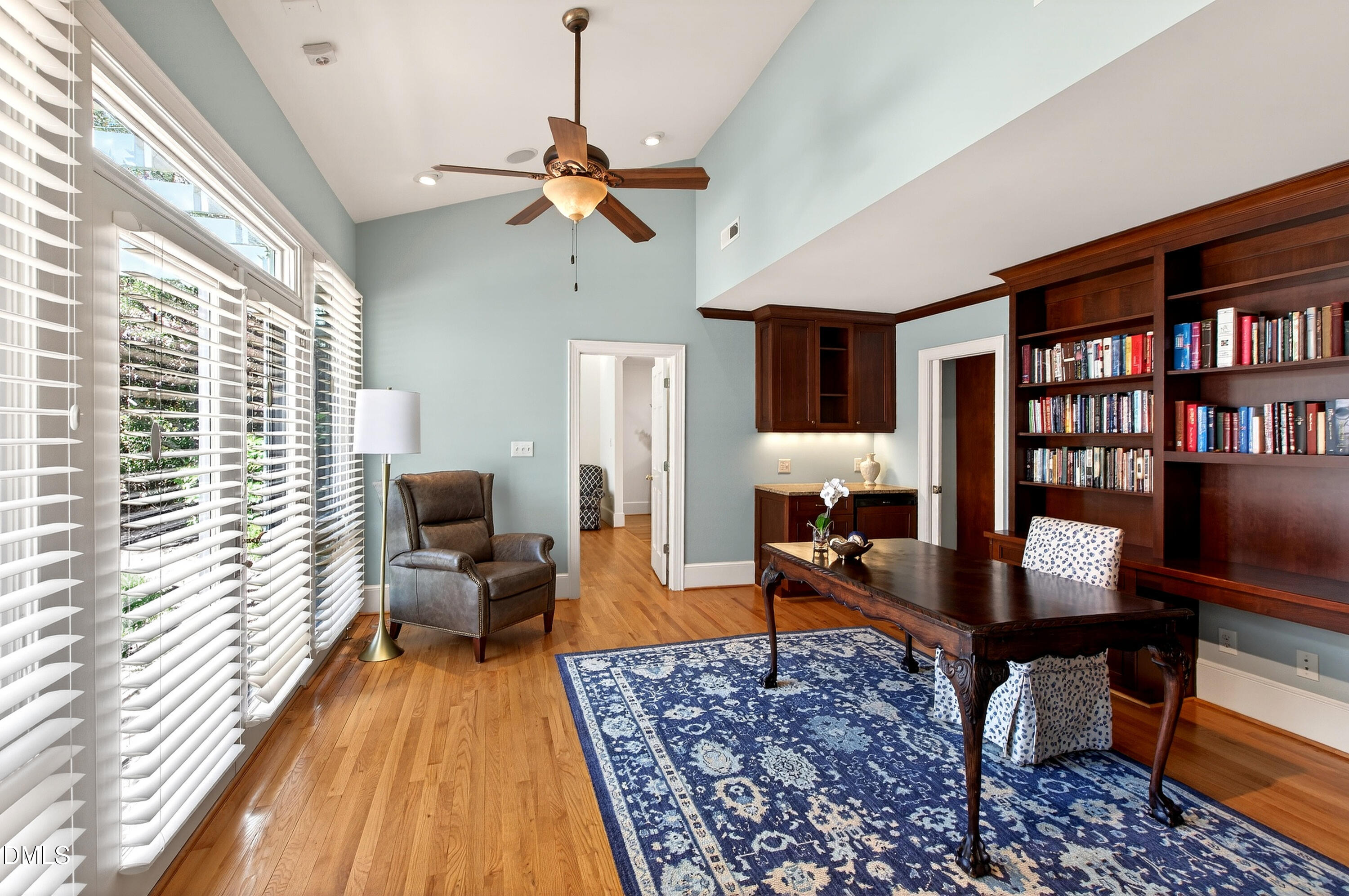2111 Cook Ridge Court Raleigh, NC 27615 - Photo 42 of 83 a living room with furniture lamps and wooden floor