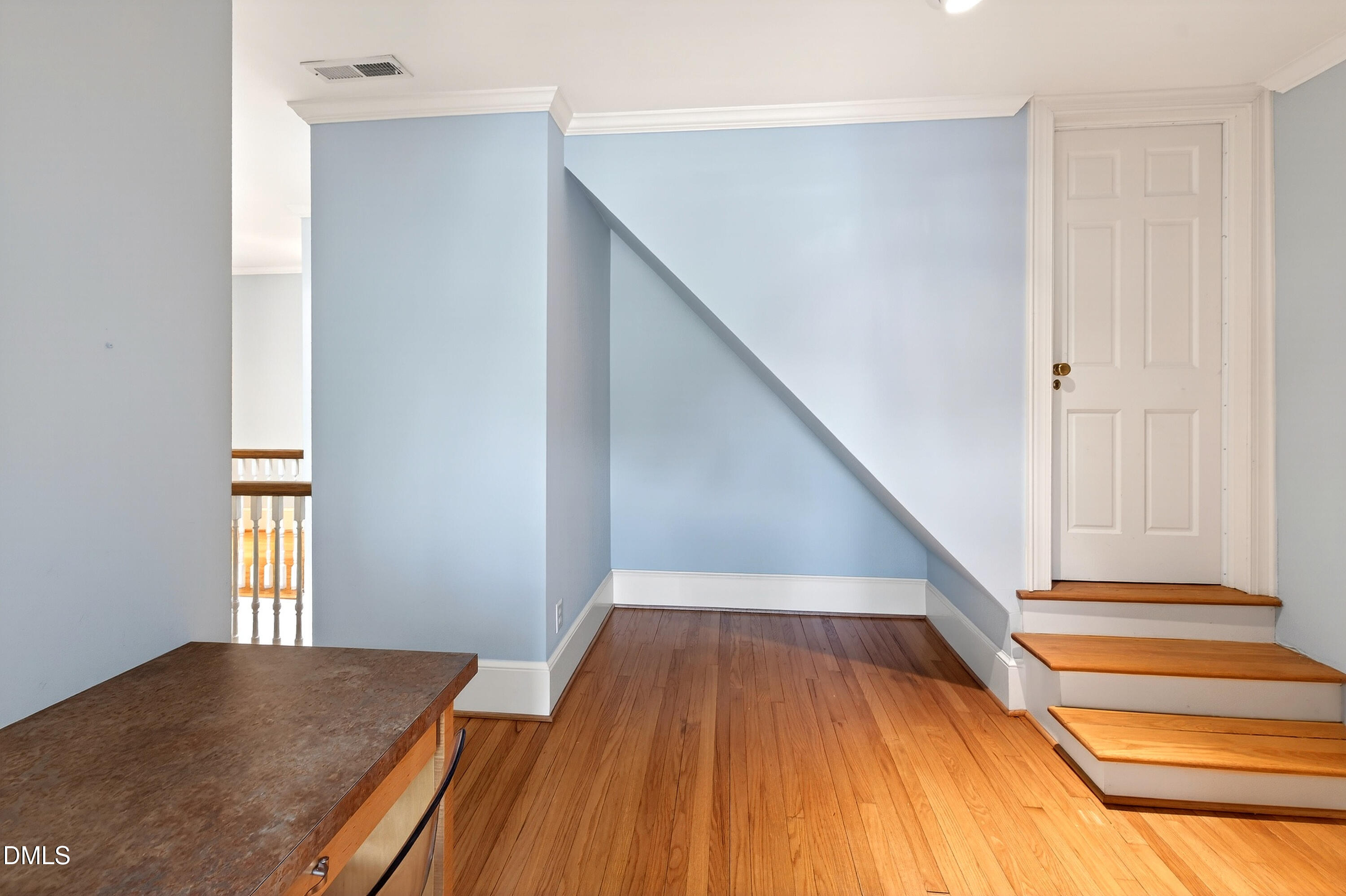 2111 Cook Ridge Court Raleigh, NC 27615 - Photo 64 of 83 a view of entryway and hall with wooden floor