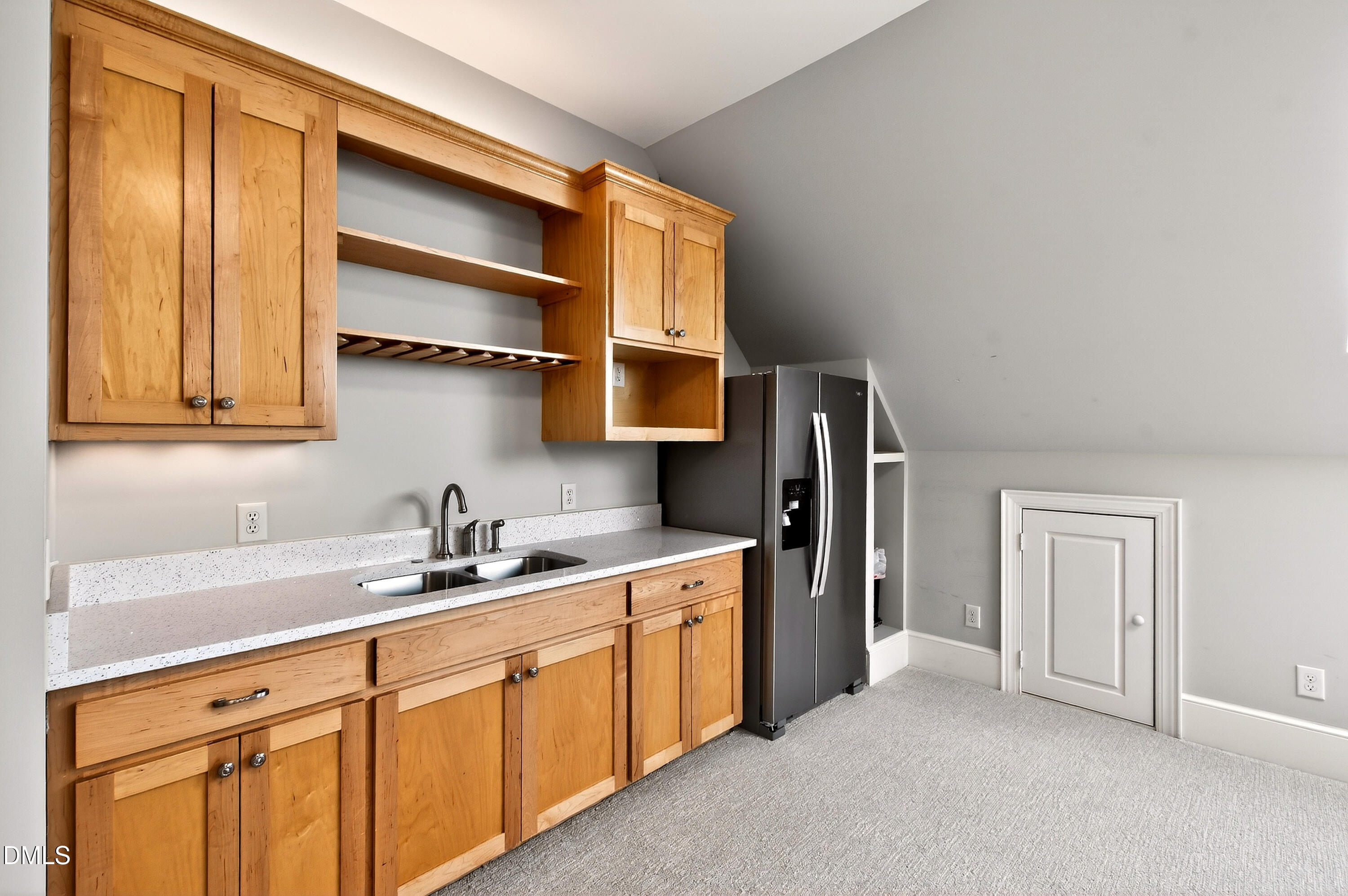2111 Cook Ridge Court Raleigh, NC 27615 - Photo 66 of 83 a kitchen with a sink and cabinets