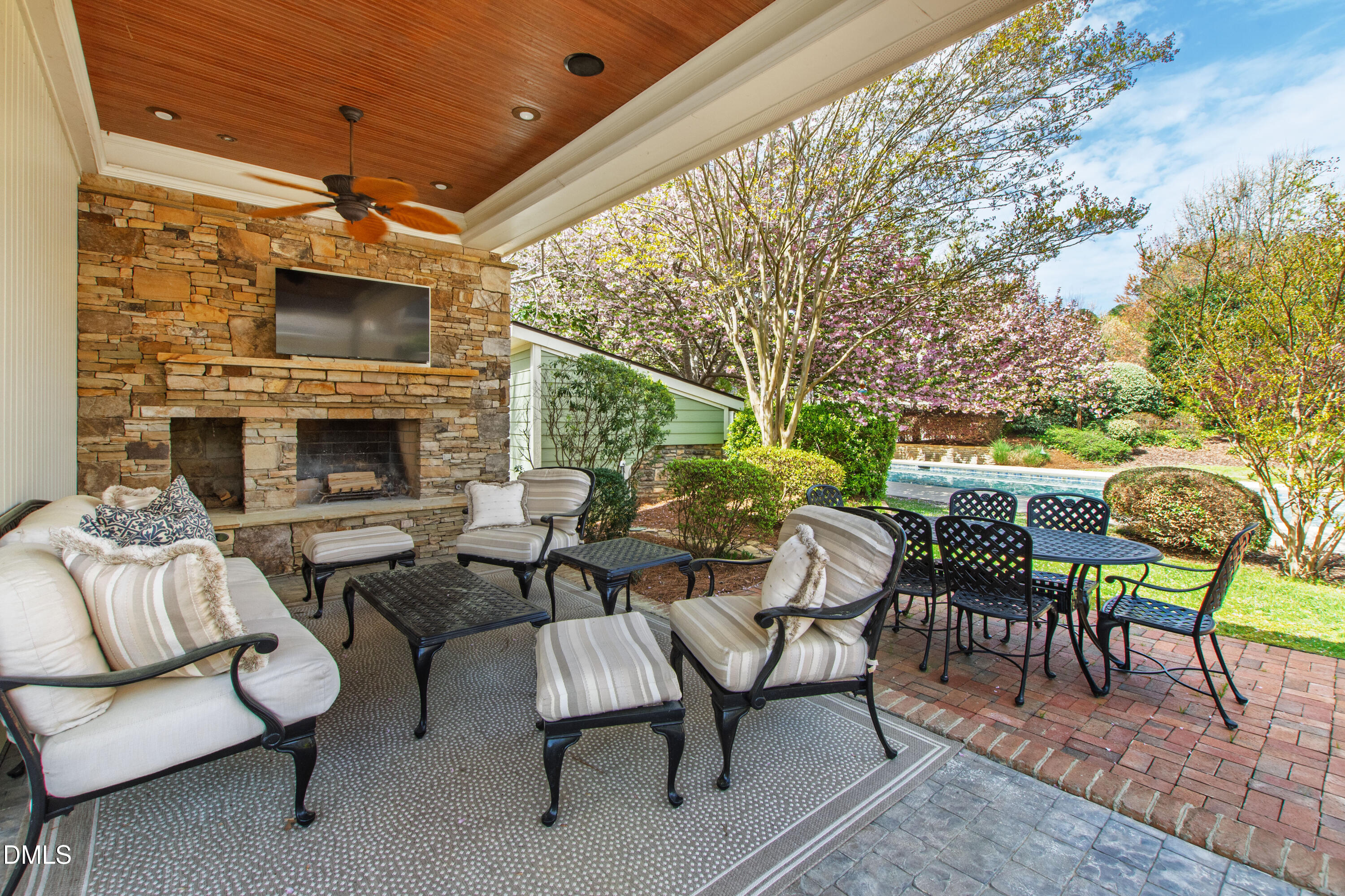 2111 Cook Ridge Court Raleigh, NC 27615 - Photo 71 of 83 a dining room with furniture and a fireplace