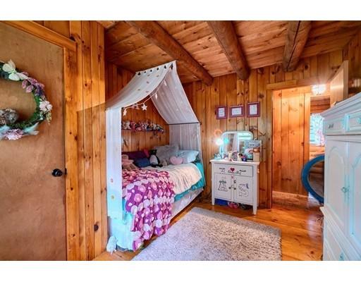 105 Sherbert Road Ashburnham, MA 01430 - Photo 24 of 32 a bedroom with a bed and a furniture