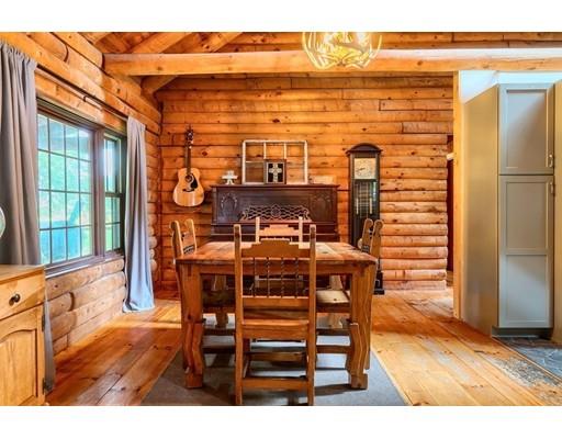105 Sherbert Road Ashburnham, MA 01430 - Photo 5 of 32 a view of a dining room with furniture and wooden floor