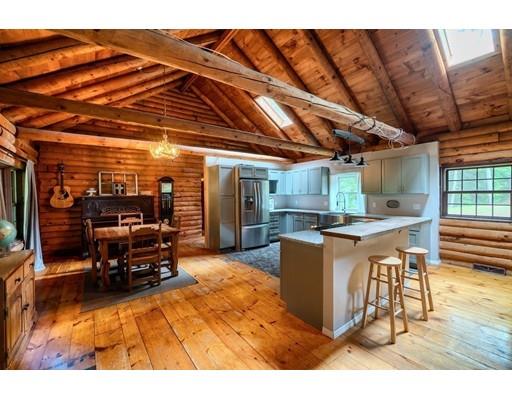 105 Sherbert Road Ashburnham, MA 01430 - Photo 6 of 32 a dining room with furniture and a kitchen view