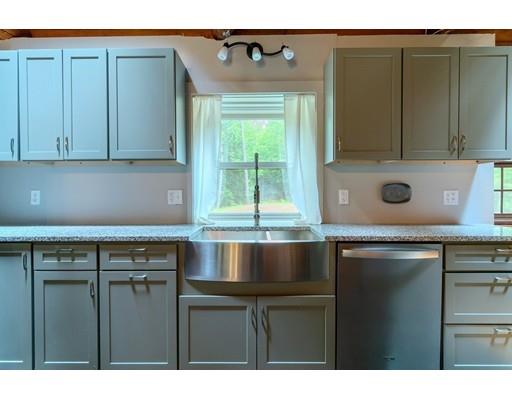 105 Sherbert Road Ashburnham, MA 01430 - Photo 10 of 32 a kitchen with a sink and cabinets