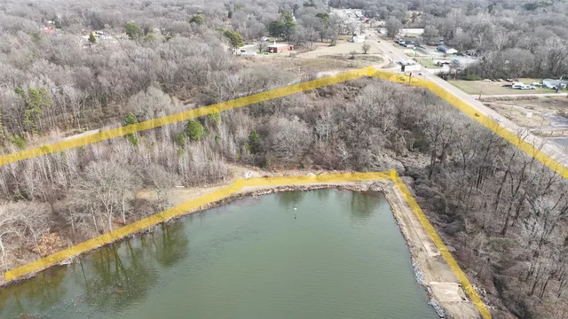 a view of swimming pool with a yard