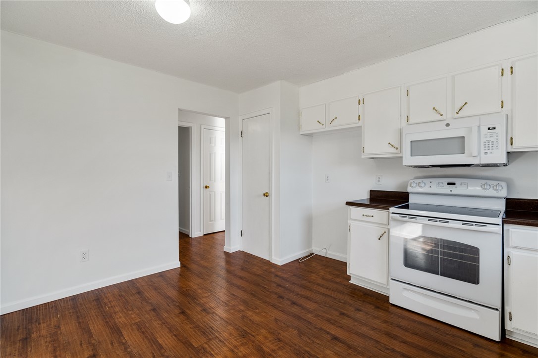 2305 Millgate Road Anderson, SC 29621 - Photo 7 of 18 A well-equipped kitchen features ample cabinet space and resilient flooring.