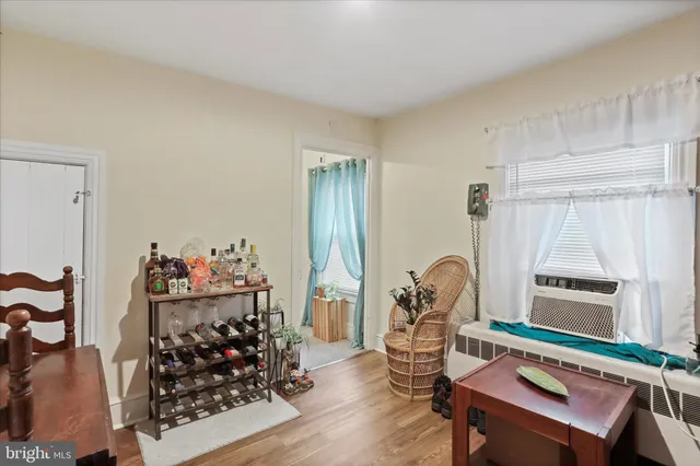 a room with furniture and a wooden floor