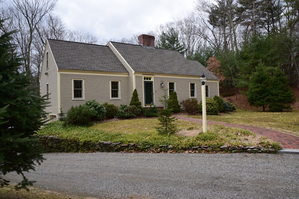 61 C Highland Road Boxford, MA 01921 - Photo 1 of 30 a front view of house with yard and green space
