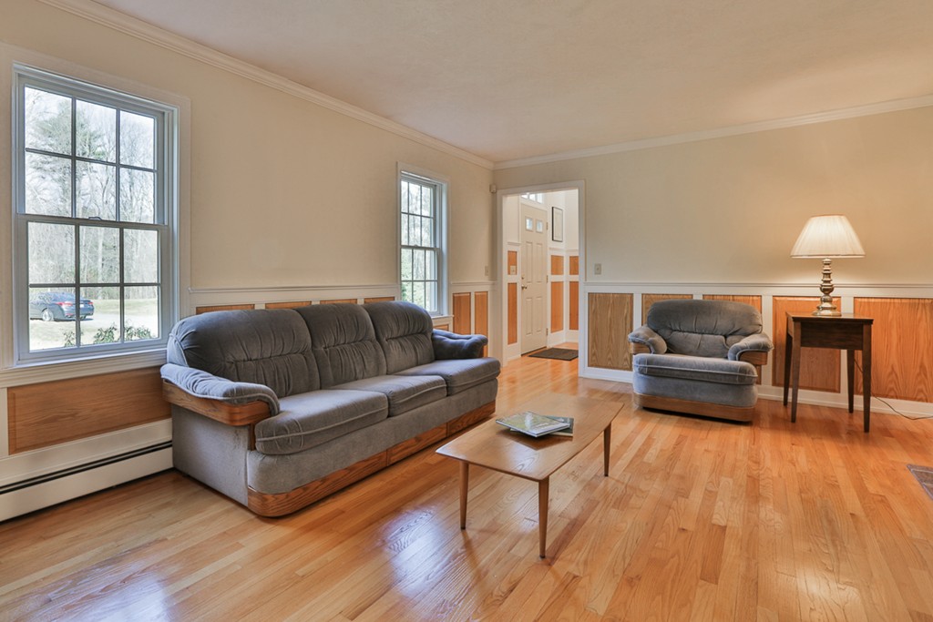 61 C Highland Road Boxford, MA 01921 - Photo 12 of 30 a living room with furniture and a wooden floor