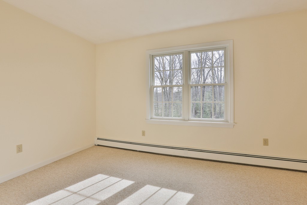 61 C Highland Road Boxford, MA 01921 - Photo 17 of 30 an empty room with a window