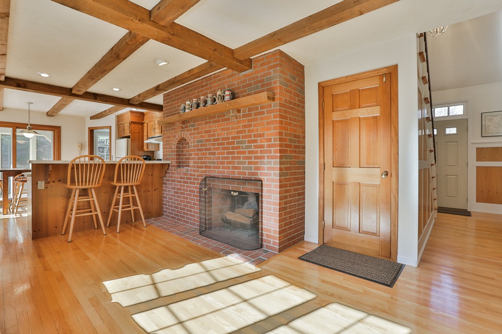 61 C Highland Road Boxford, MA 01921 - Photo 4 of 30 a view of a livingroom with furniture and an empty room