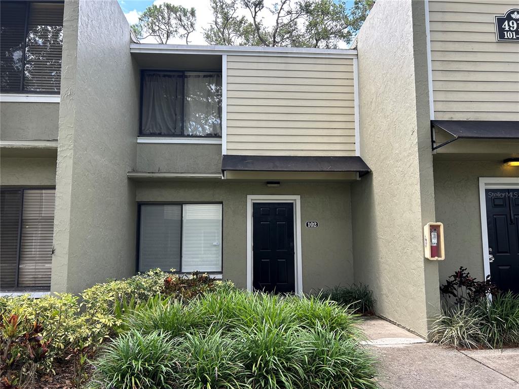 a house view with a outdoor space
