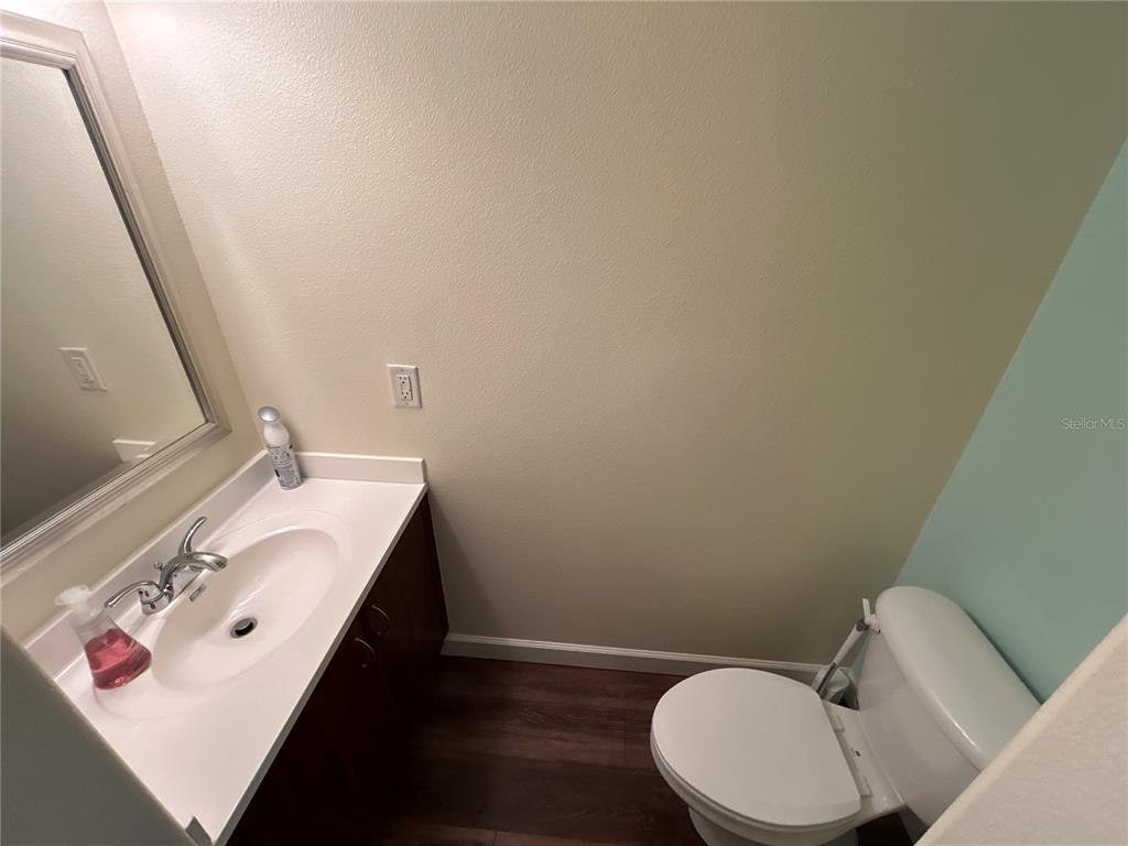 4912 25th Street West, Unit 102 Bradenton, FL 34207 - Photo 6 of 12 a bathroom with a sink and a toilet