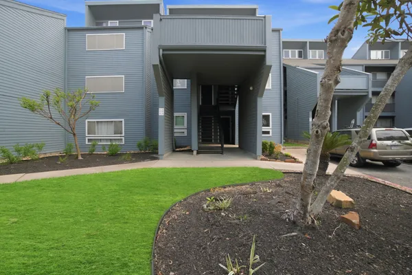a view of a building with a patio