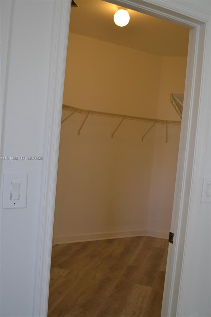 10770 Southwest 245th Street Homestead, FL 33032 - Photo 29 of 47 Master bedroom walk in closet.