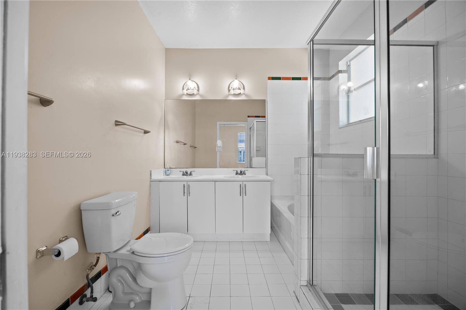 10770 Southwest 245th Street Homestead, FL 33032 - Photo 31 of 47 Master bathroom has standing shower and bathtub.