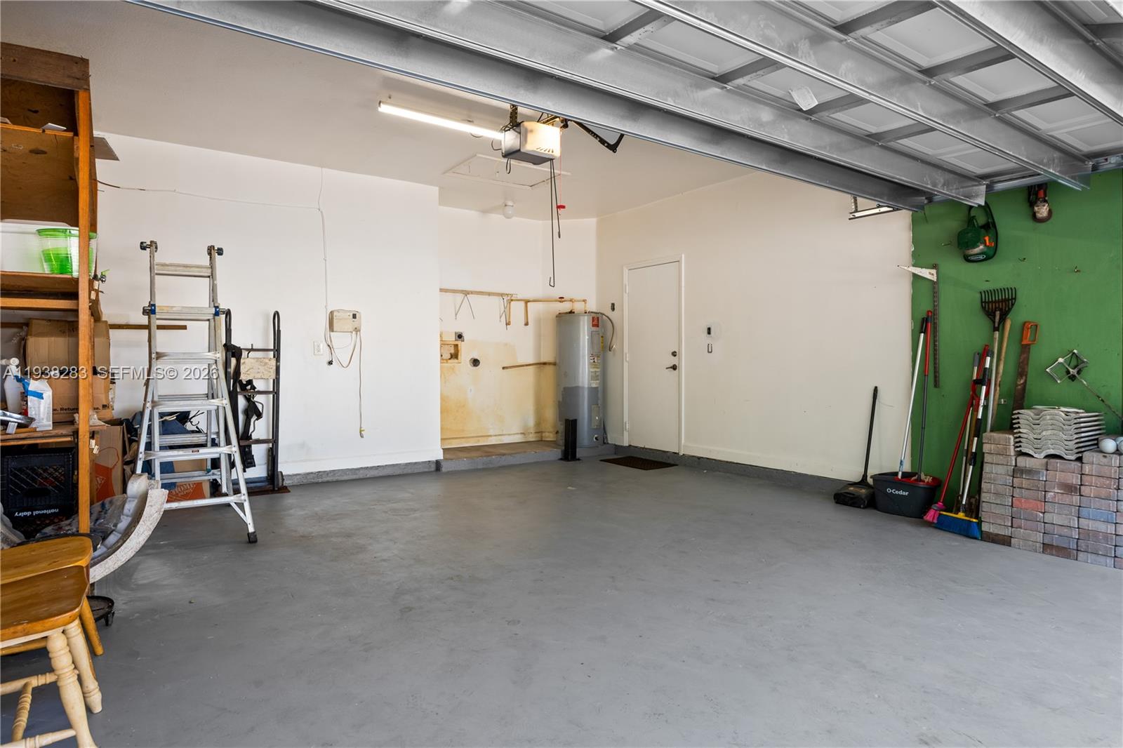 10770 Southwest 245th Street Homestead, FL 33032 - Photo 36 of 47 Two car garage with water heater and Washer/Dryer hookup.