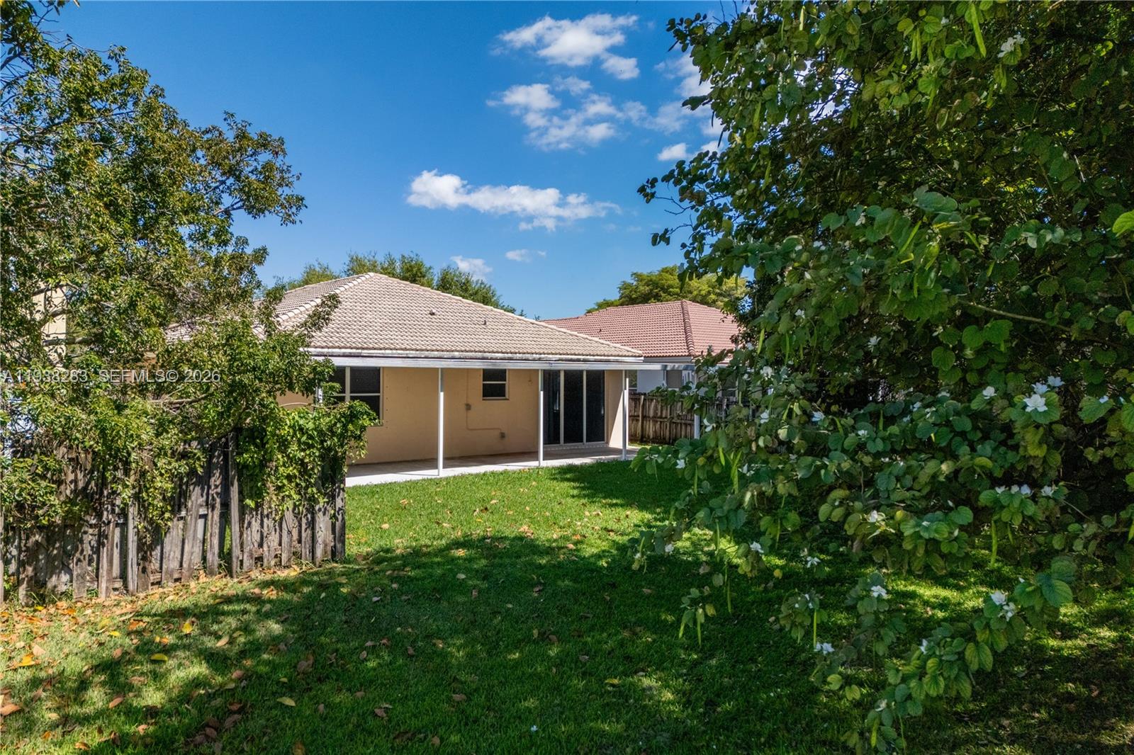 10770 Southwest 245th Street Homestead, FL 33032 - Photo 41 of 47 View of the backyard from the HOA common area.