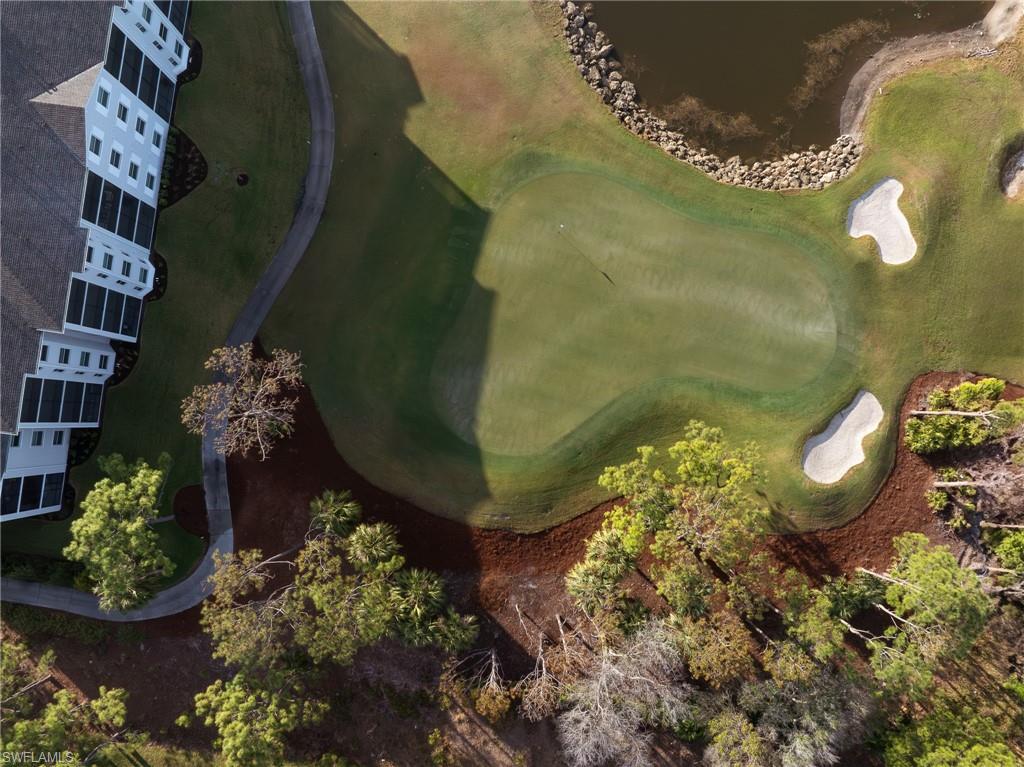 18461 Copperhead Drive, Unit 418 Lehigh Acres, FL 33936 - Photo 26 of 33 Exterior view of a golf course