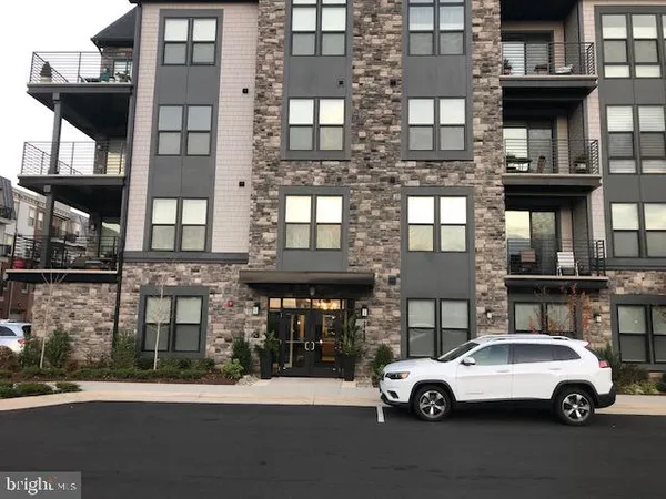 a car parked in front of a building