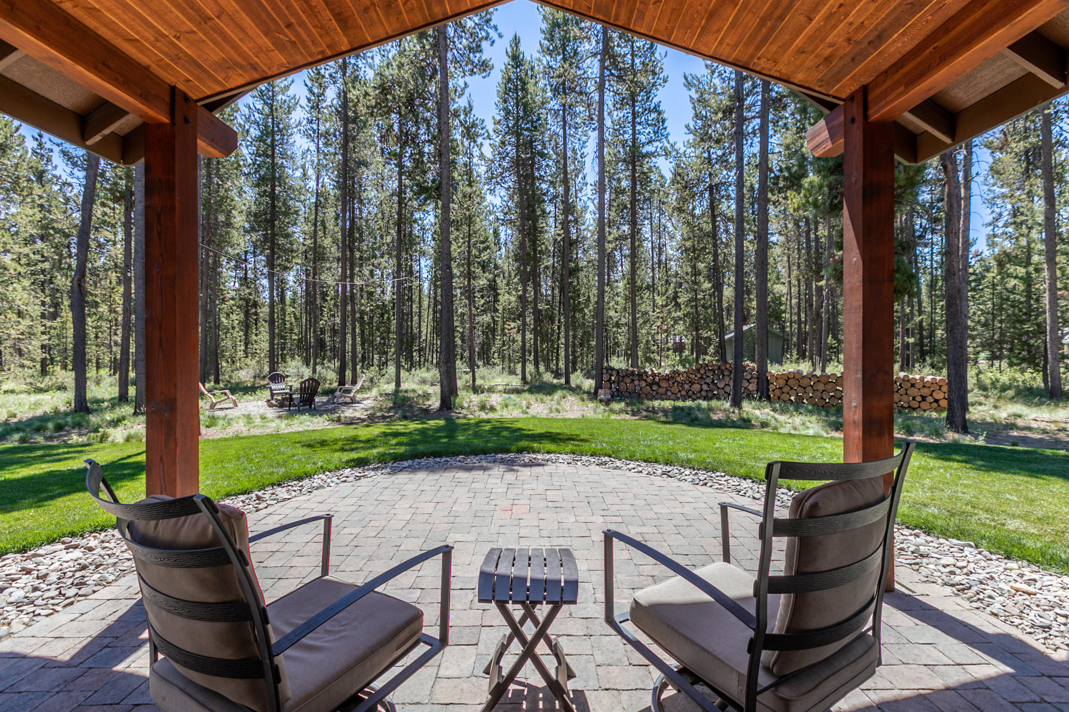 17067 Glendale Road Bend, OR 97707 - Photo 5 of 29 a view of a chair and table in the garden