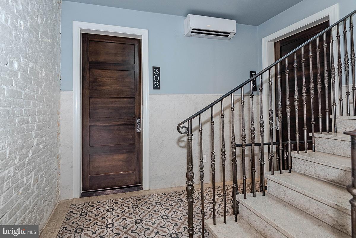418 7th Street Southeast, Unit 302 Washington, DC 20003 - Photo 6 of 35 a view of entryway with stairs