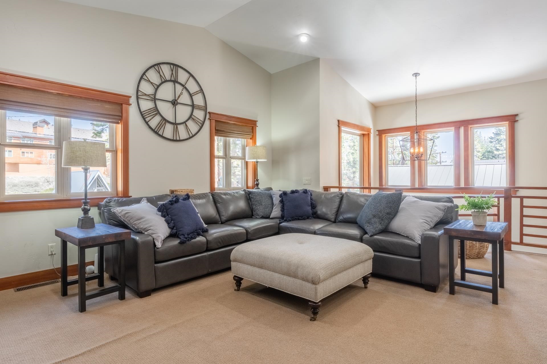 125 Davison Road, Unit 1 Mammoth Lakes, CA 93546 - Photo 4 of 46 a living room with furniture a window and a chandelier