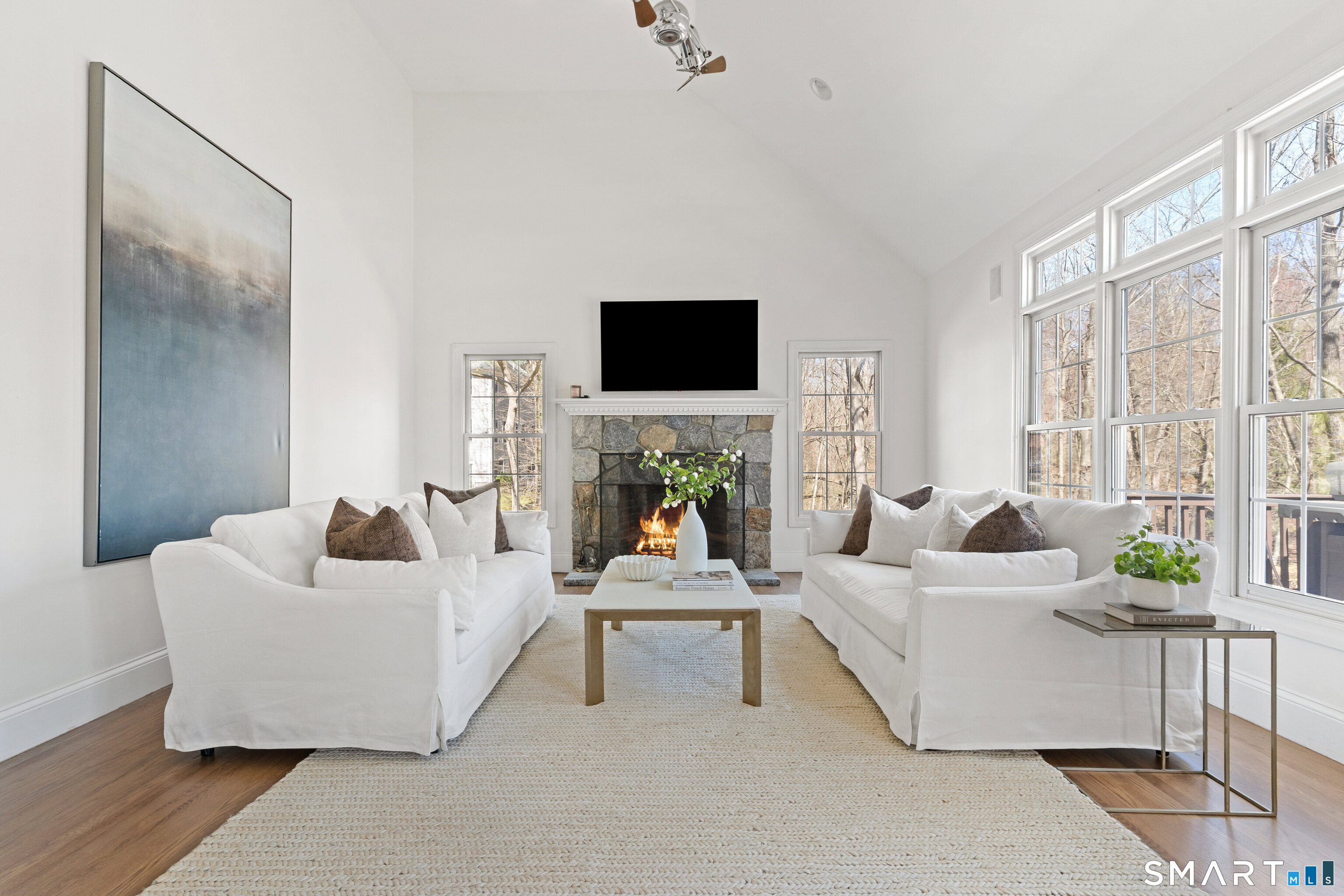 350 Chestnut Hill Road Norwalk, CT 06851 - Photo 17 of 37 Family room with cathedral ceiling and beautiful windows