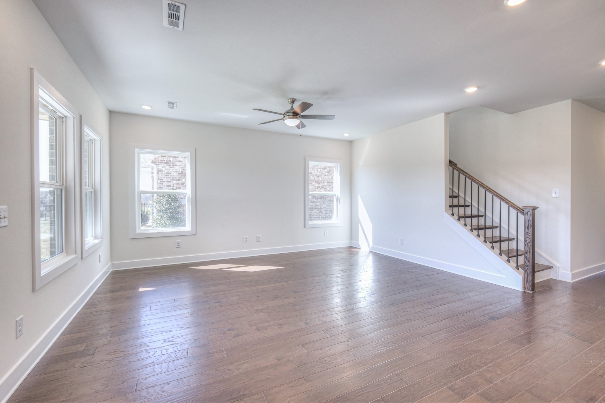 608 Phoebe Way Gallatin, TN 37066 - Photo 17 of 40 wooden floor in an empty room with a window
