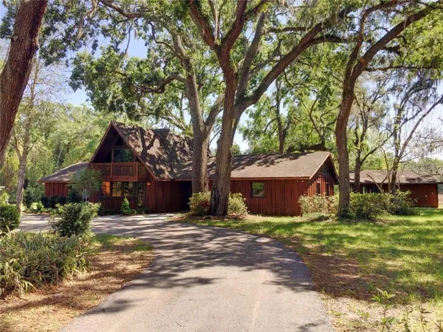 a house with trees in front of it