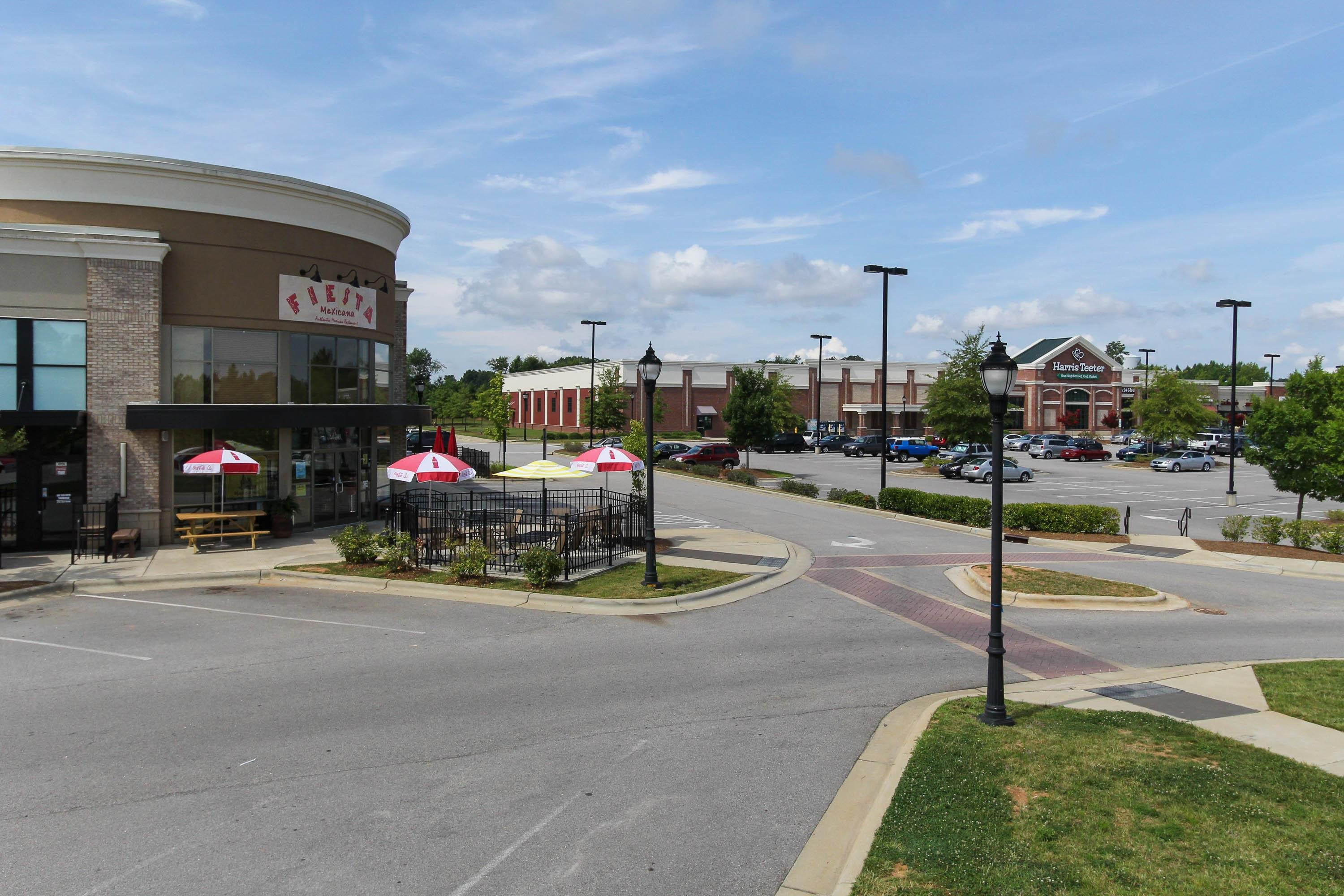 136 Corapeake Way Apex, NC 27539 - Photo 23 of 27 a view of a street with cars