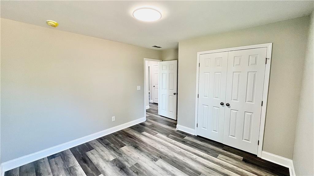 5 Green Road Griffin, GA 30224 - Photo 25 of 34 a view of a room with wooden floor