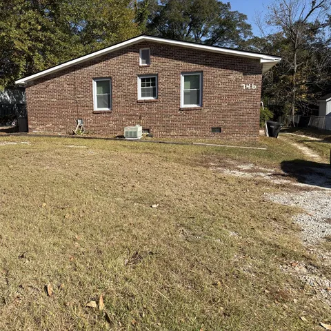 a front view of house with yard