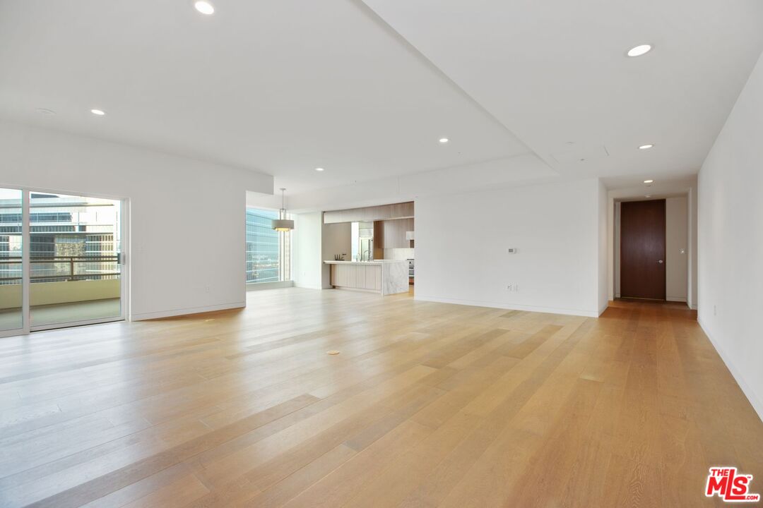1 West Century Drive, Unit 8D Los Angeles, CA 90067 - Photo 7 of 12 a view of empty room with wooden floor