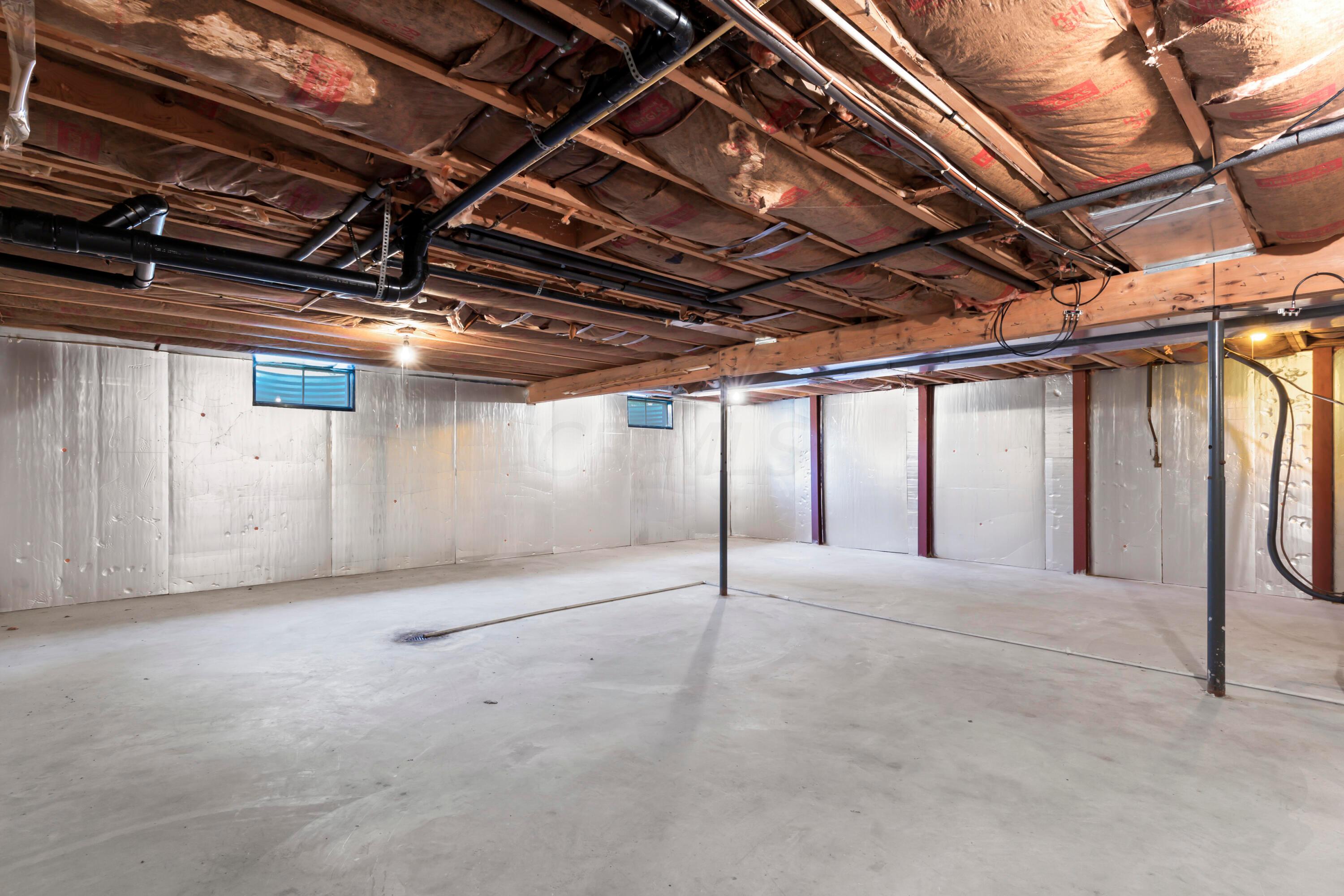 5764 Cheshire Road Galena, OH 43021 - Photo 35 of 59 • Full with crawl space
• Concrete block foundation
• Utility sink
• Sump pump
• Electric dryer hookup
• New A.O.Smith® electric
water heater ~ 2021
• Lennox® central air
conditioner